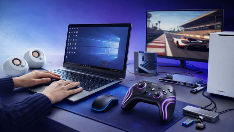 Laptop, kontroler, głośniki, monitor.